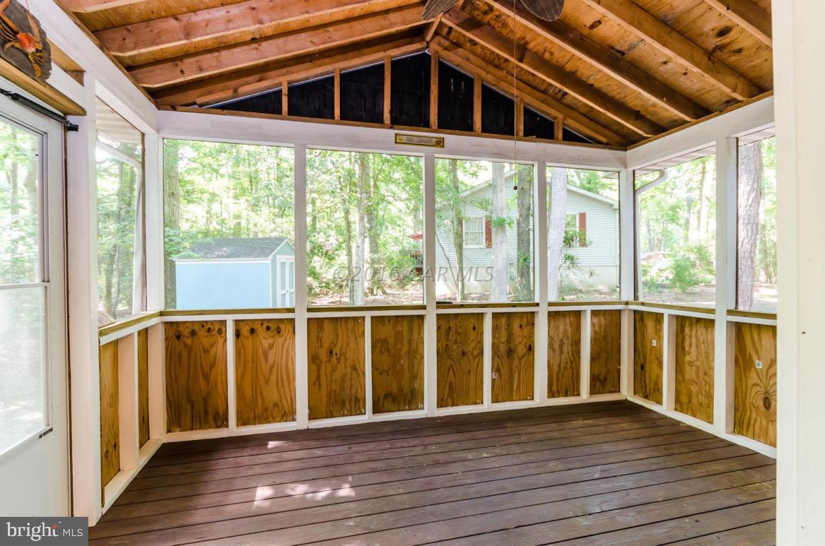 13 Capetown Road Ocean Pines, MD 21811 - Photo 10 of 46 a view of porch with wooden floor