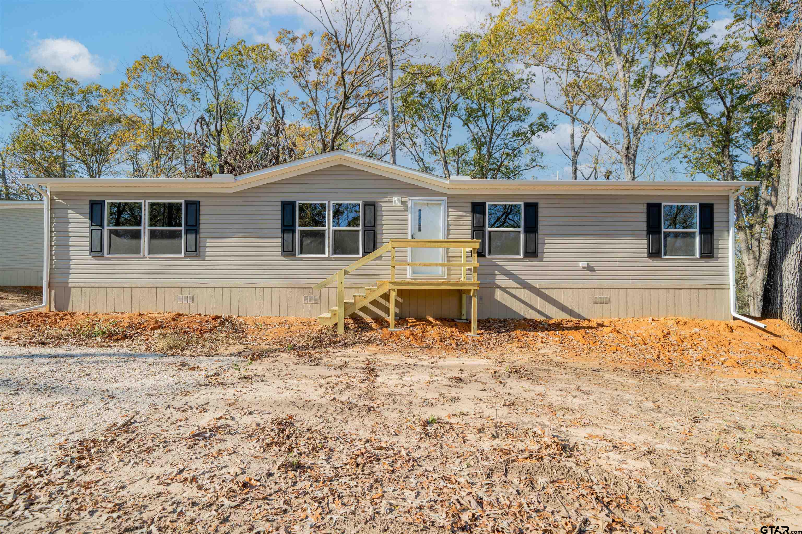 Mh1 Mh1 Mh1 Leesburg, TX 75451 - Photo 23 of 23 a house with trees in the background