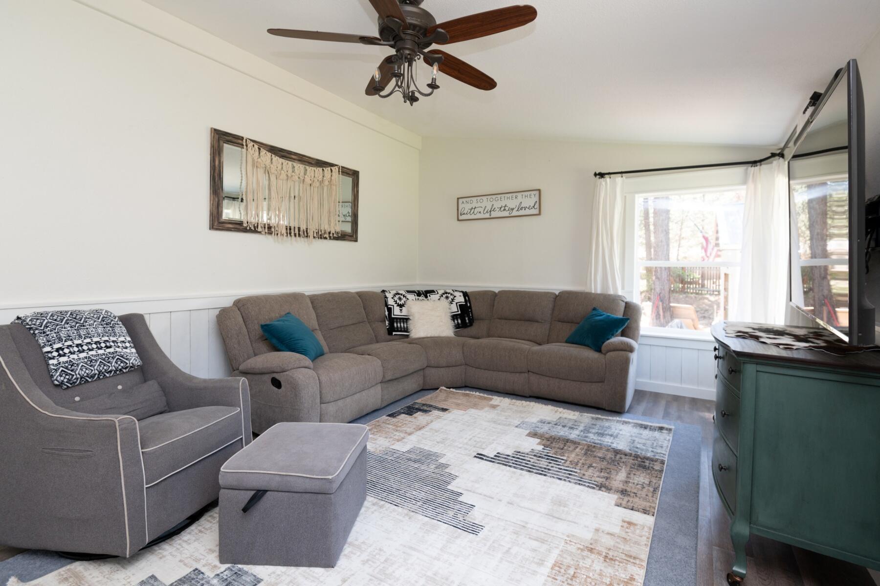 16990 Covina Road Bend, OR 97707 - Photo 11 of 56 a living room with furniture and a window