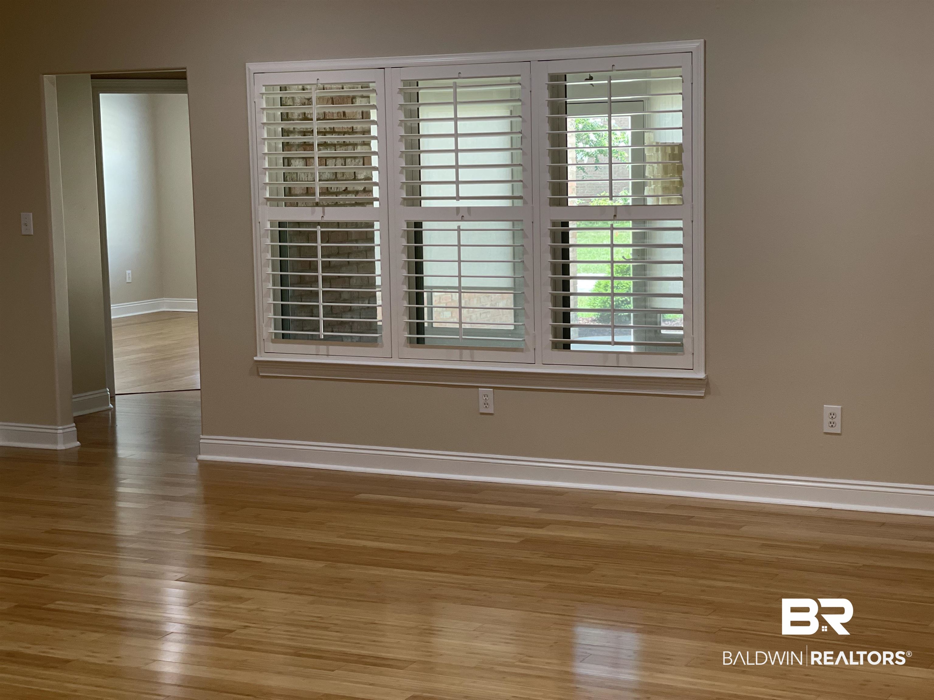 210 Savannah Circle Foley, AL 36535 - Photo 9 of 18 Spare room featuring hardwood / wood-style floors