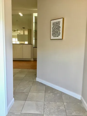 a view of a bathroom with a glass door shower