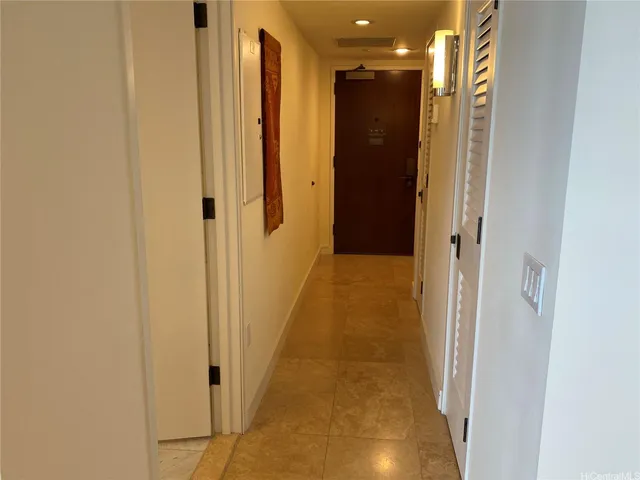 a view of entryway with washer and dryer