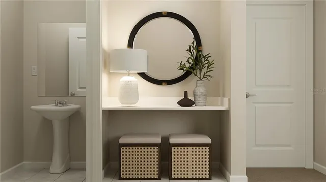 a close view of a sink a mirror and a vanity