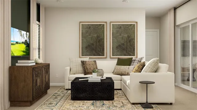 a living room with furniture and a window