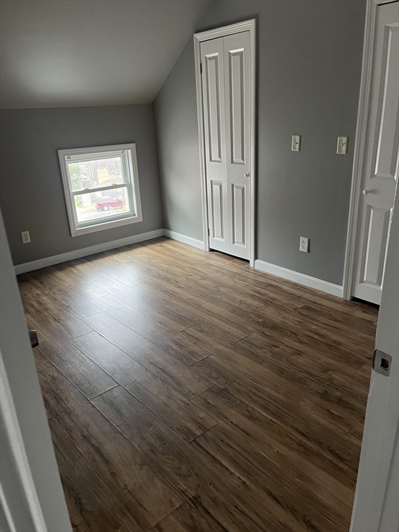 422 County Street Fall River, MA 02723 - Photo 13 of 25 an empty room with wooden floor and windows