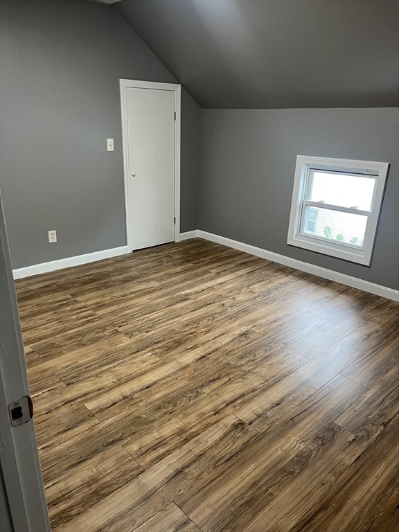 422 County Street Fall River, MA 02723 - Photo 20 of 25 an empty room with wooden floor and windows