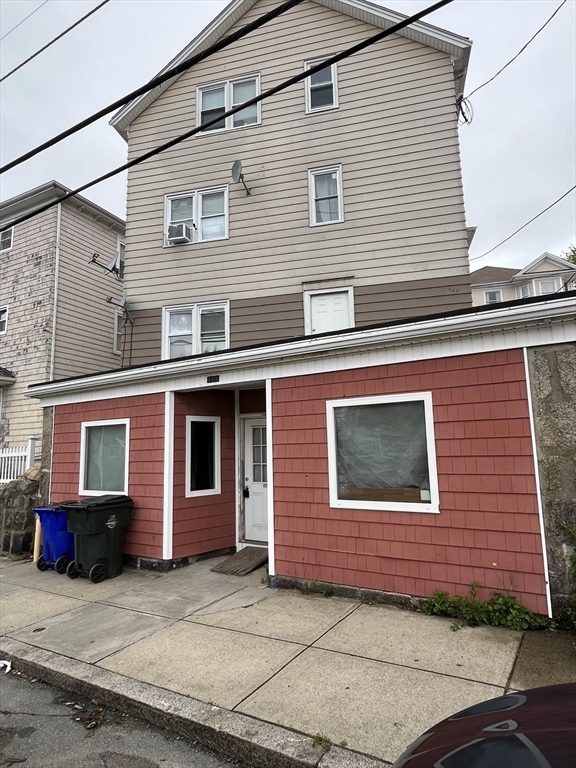 422 County Street Fall River, MA 02723 - Photo 2 of 25 a view of a house with windows