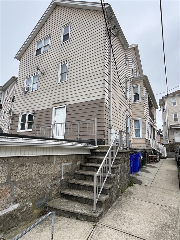 422 County Street Fall River, MA 02723 - Photo 3 of 25 a front view of a house with stairs