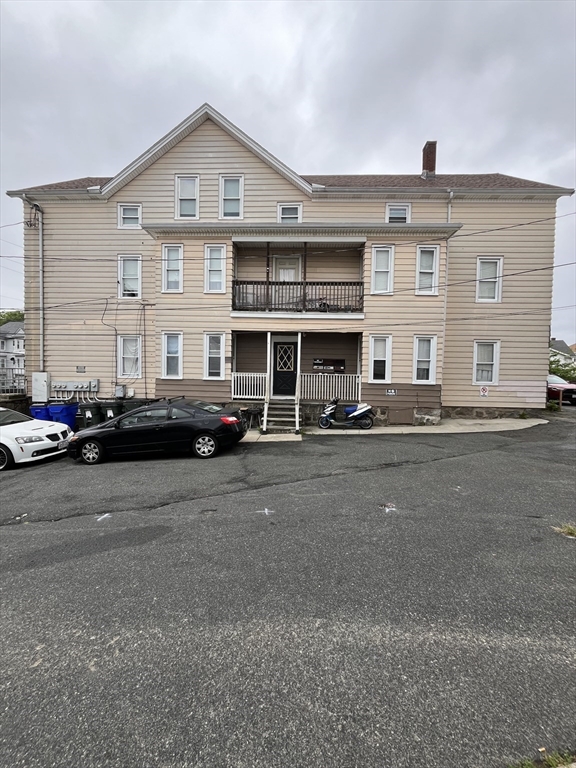 422 County Street Fall River, MA 02723 - Photo 4 of 25 a front view of a building with street view