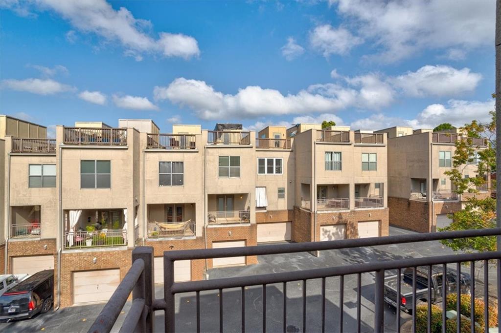 238 Walker Street Southwest, Unit 32 Atlanta, GA 30313 - Photo 17 of 17 a view of a building from a balcony