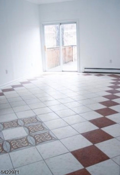 5 Timothy Street, Unit 4 Paterson, NJ 07503 - Photo 3 of 16 a view of a room with windows