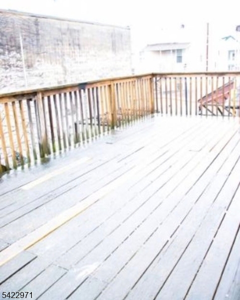 5 Timothy Street, Unit 4 Paterson, NJ 07503 - Photo 9 of 16 a balcony with a ocean view