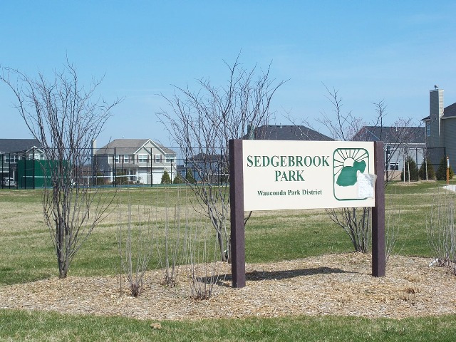 2694 Reedgrass Way Wauconda, IL 60084 - Photo 9 of 12 a view of a park with welcome board