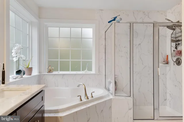 a bathroom with a sink and a bathtub
