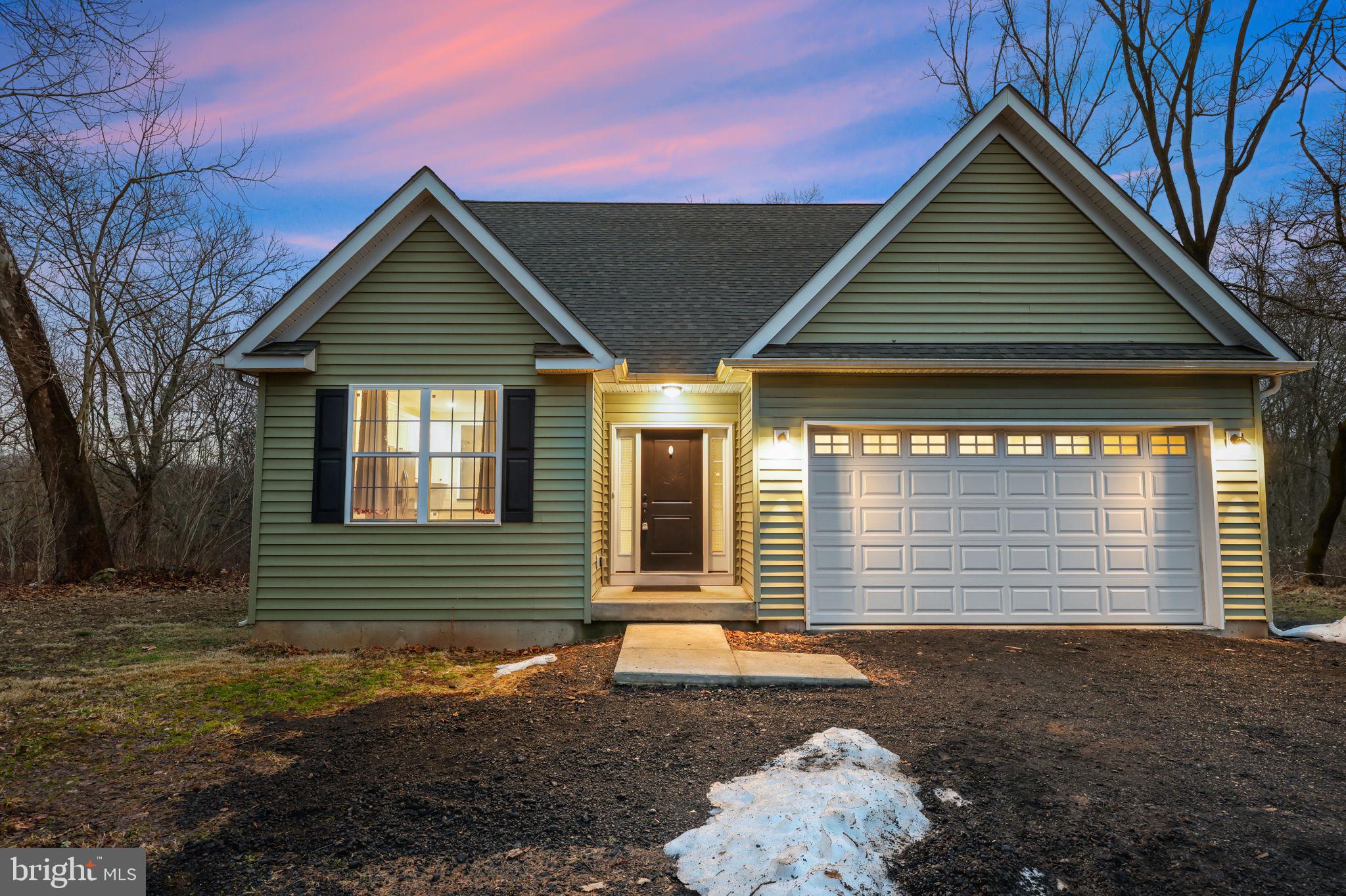 588 Almshouse Road Doylestown, PA 18901 - Photo 1 of 31 a front view of a house with a yard