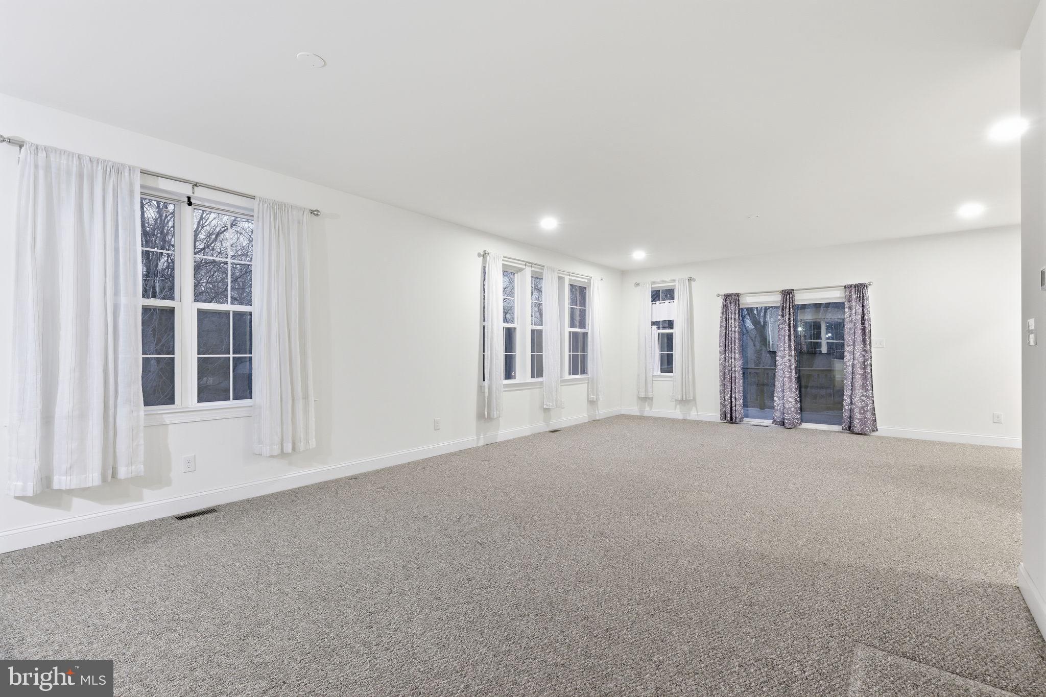 588 Almshouse Road Doylestown, PA 18901 - Photo 12 of 31 a view of an empty room with a window