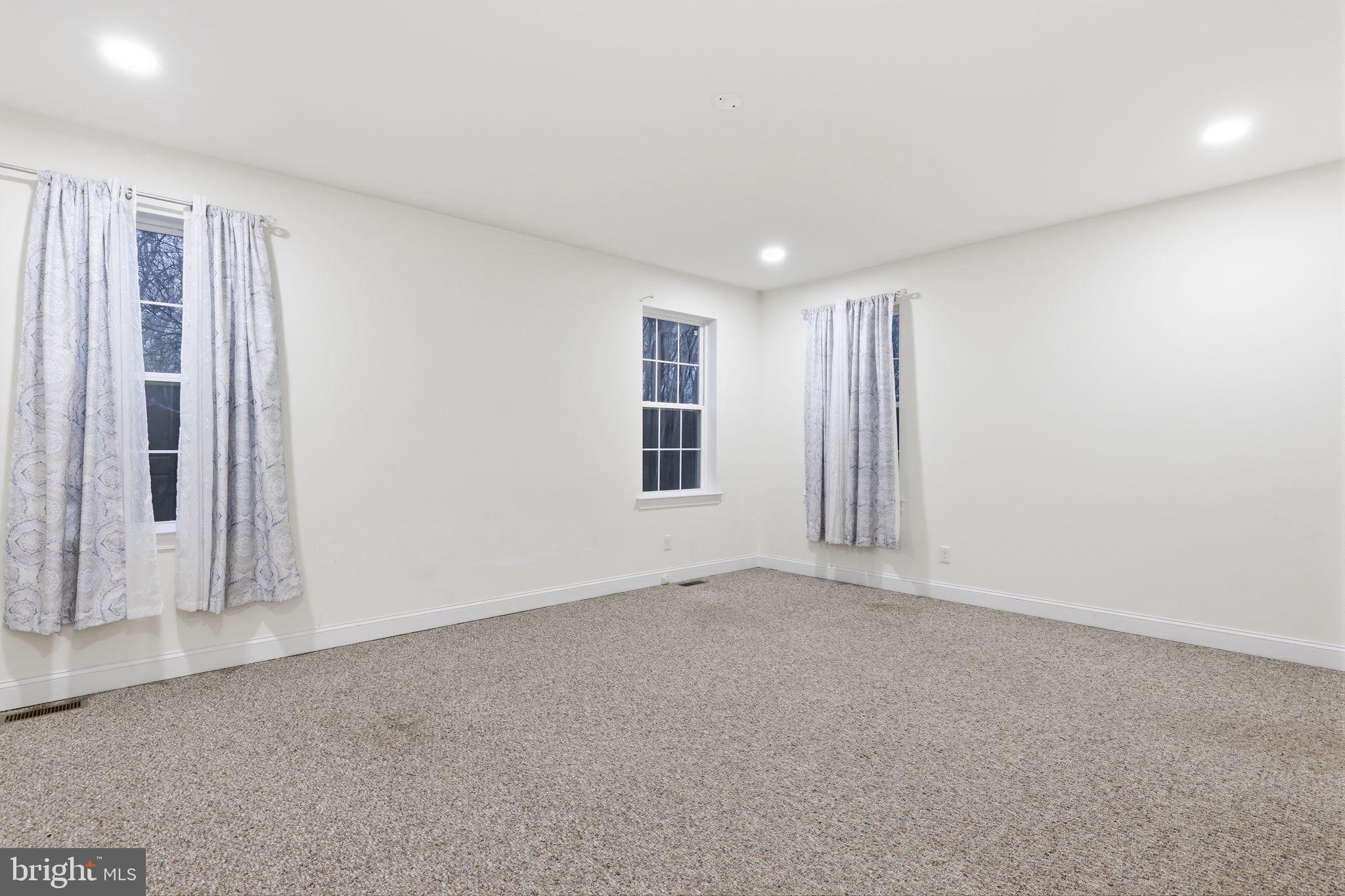 588 Almshouse Road Doylestown, PA 18901 - Photo 16 of 31 an empty room with windows