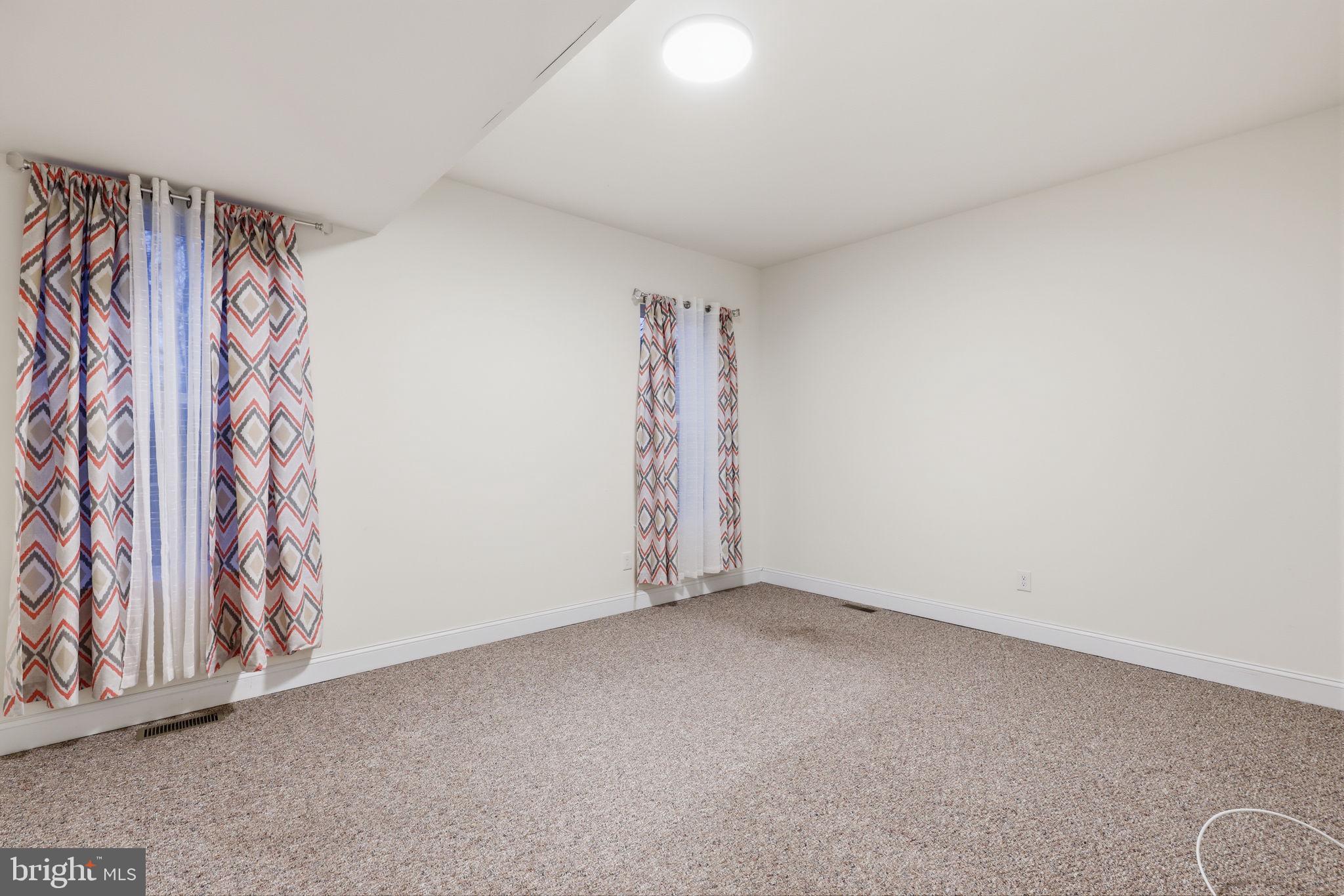 588 Almshouse Road Doylestown, PA 18901 - Photo 22 of 31 a view of room with stairs and a window