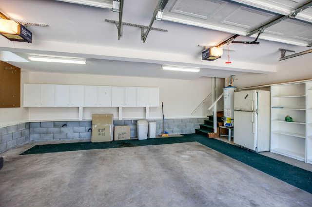 864 Rands Way Columbia, TN 38401 - Photo 16 of 20 Great garaage with lots of shelving and cabinets.