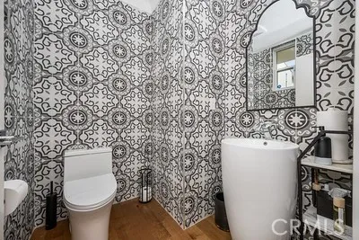 a bathroom with a toilet and a sink