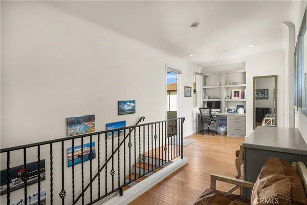 a view of a livingroom with furniture and wooden floor