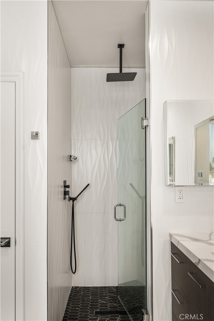 340 5th Street Huntington Beach, CA 92648 - Photo 28 of 48 a bathroom with a shower