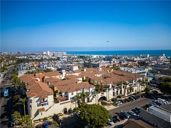 an aerial view of a city with lots of residential buildings