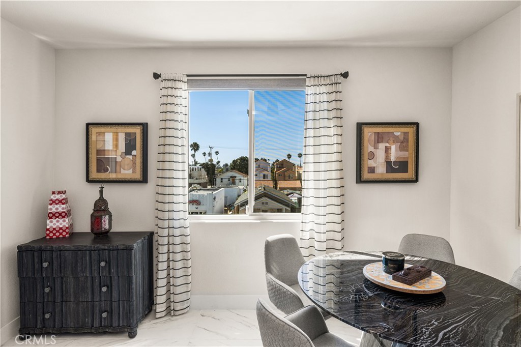 340 5th Street Huntington Beach, CA 92648 - Photo 10 of 48 a living room with furniture and wooden floor