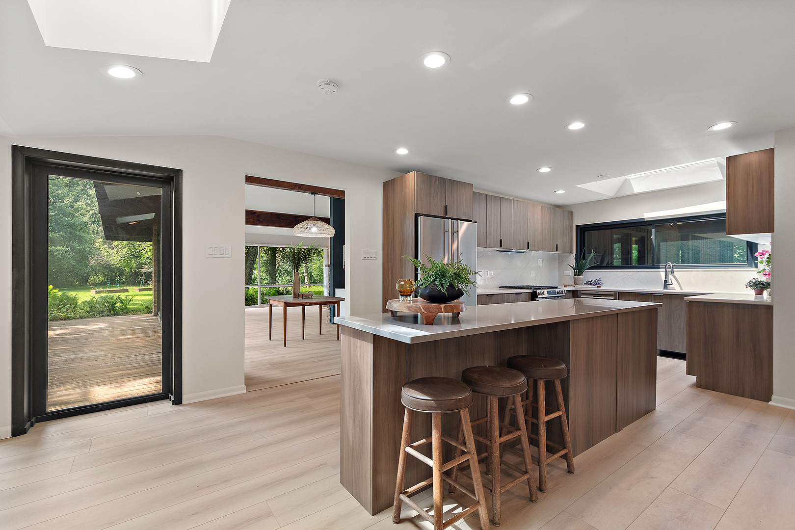 71 Graymoor Lane Olympia Fields, IL 60461 - Photo 15 of 36 a kitchen with kitchen island granite countertop a sink and counter space