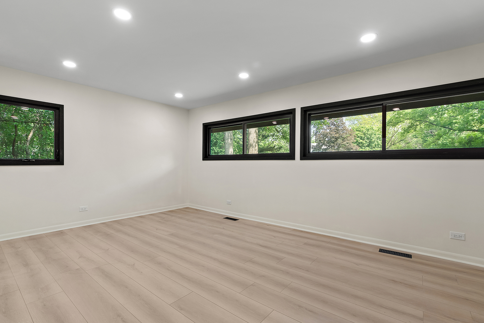 71 Graymoor Lane Olympia Fields, IL 60461 - Photo 22 of 36 an empty room with wooden floor and windows