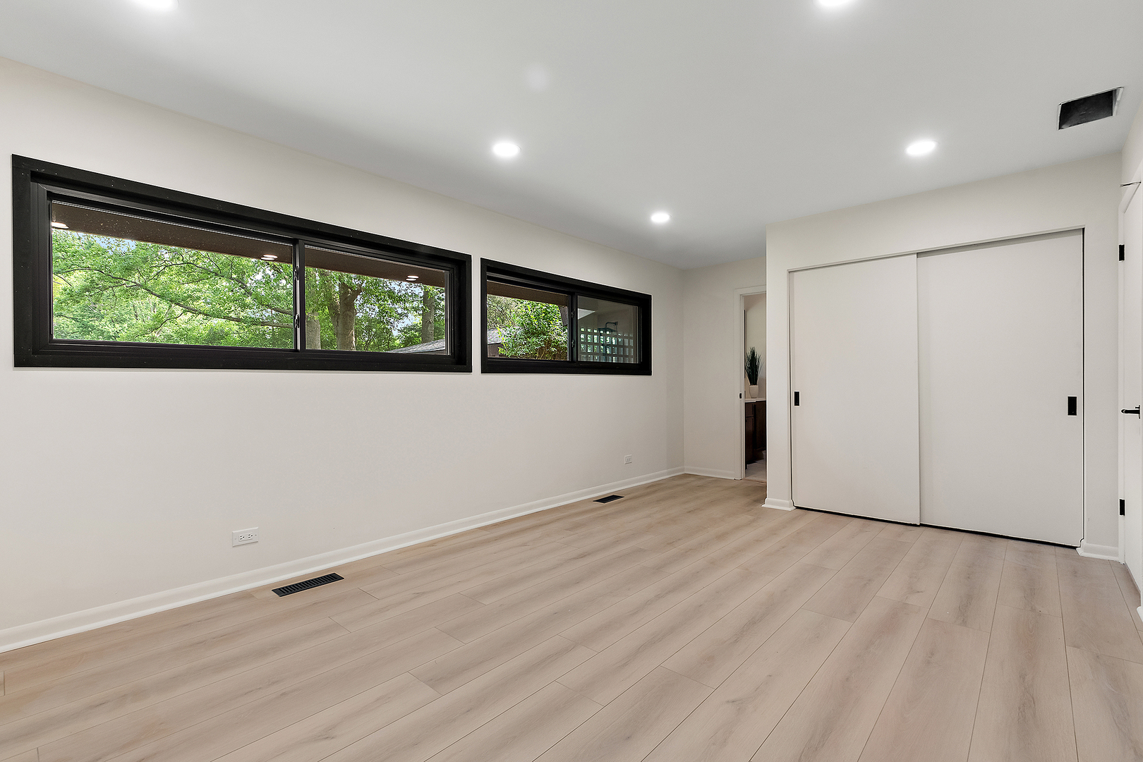 71 Graymoor Lane Olympia Fields, IL 60461 - Photo 23 of 36 an empty room with wooden floor and windows