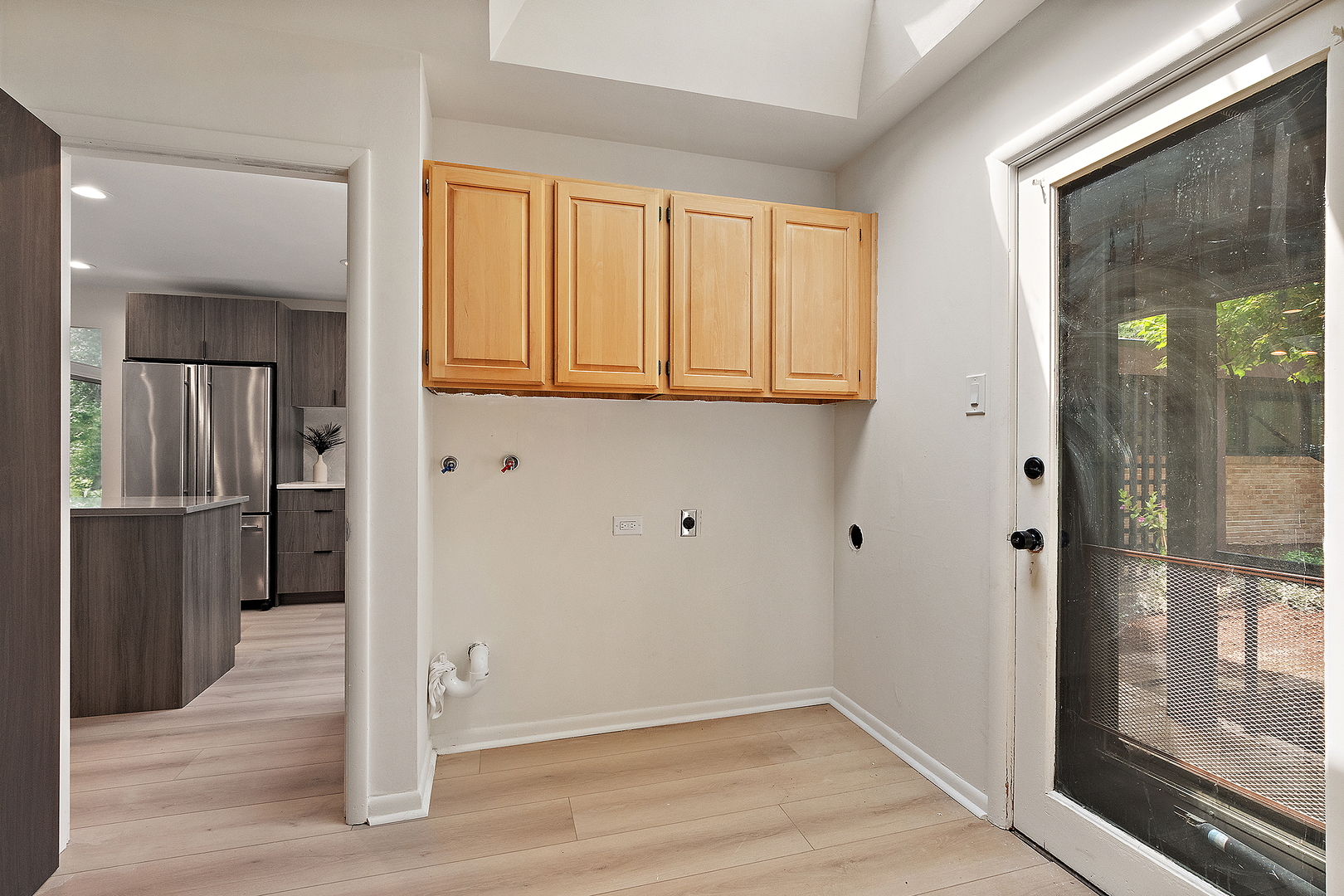 71 Graymoor Lane Olympia Fields, IL 60461 - Photo 30 of 36 a view of empty room with wooden floor and entryway