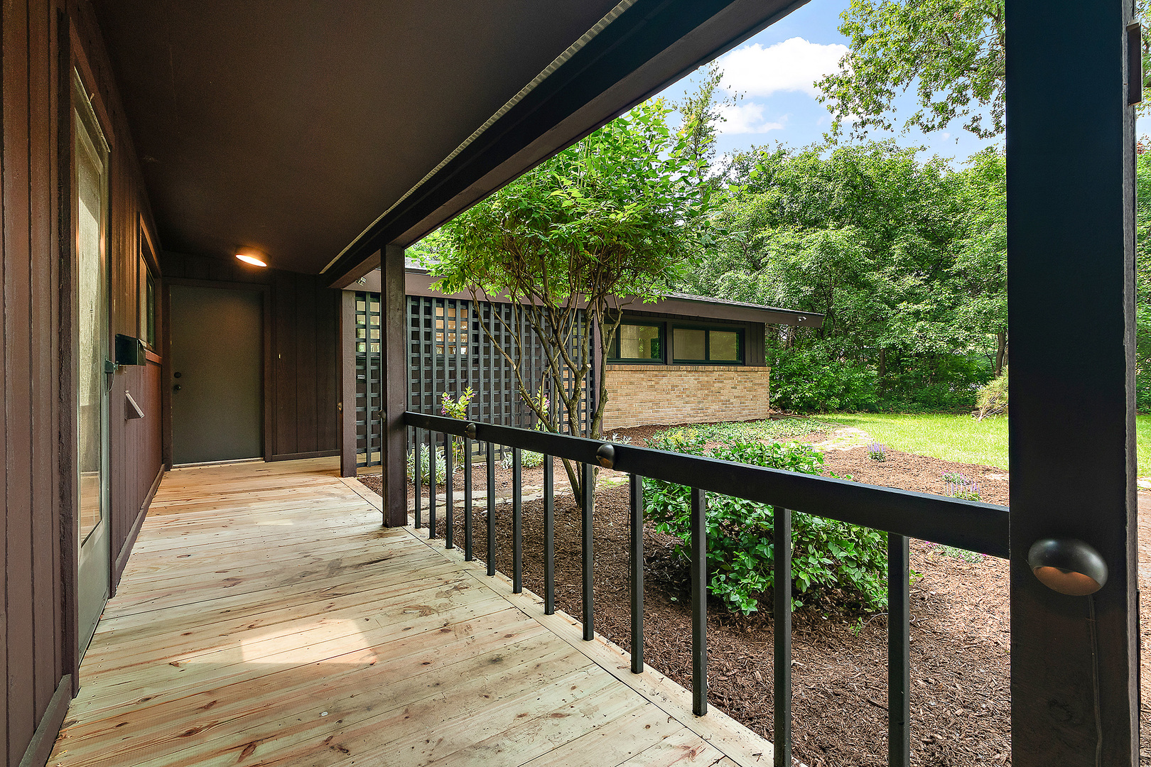 71 Graymoor Lane Olympia Fields, IL 60461 - Photo 4 of 36 a view of a balcony with wooden floor