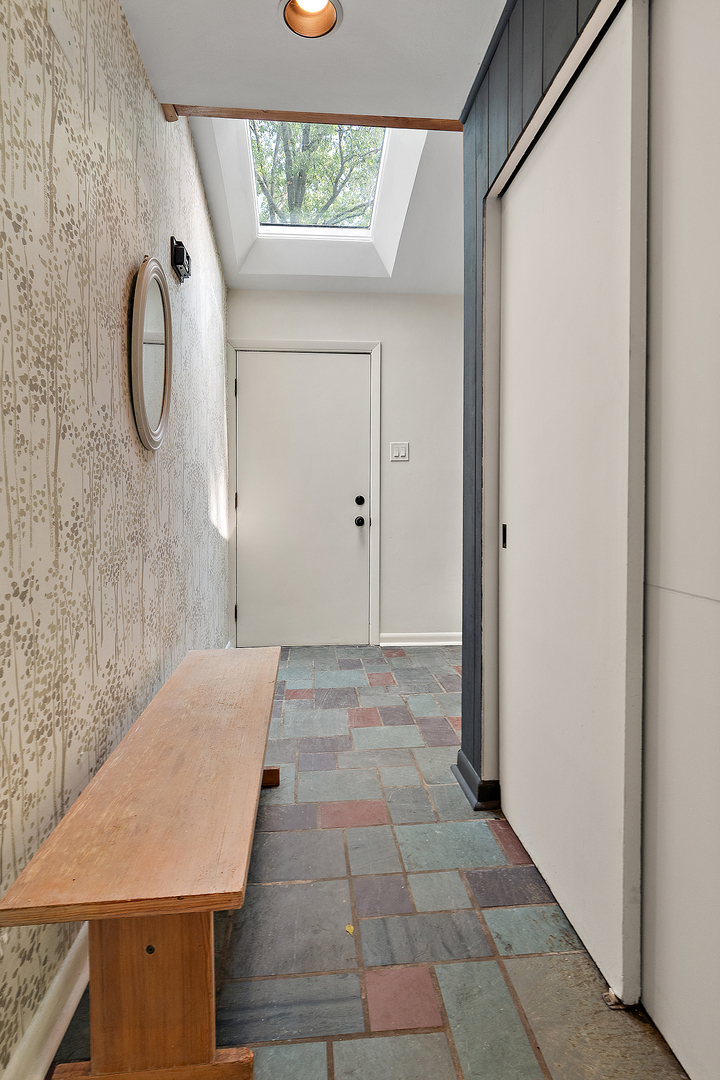 71 Graymoor Lane Olympia Fields, IL 60461 - Photo 7 of 36 a view of a bathroom with a sink and mirror