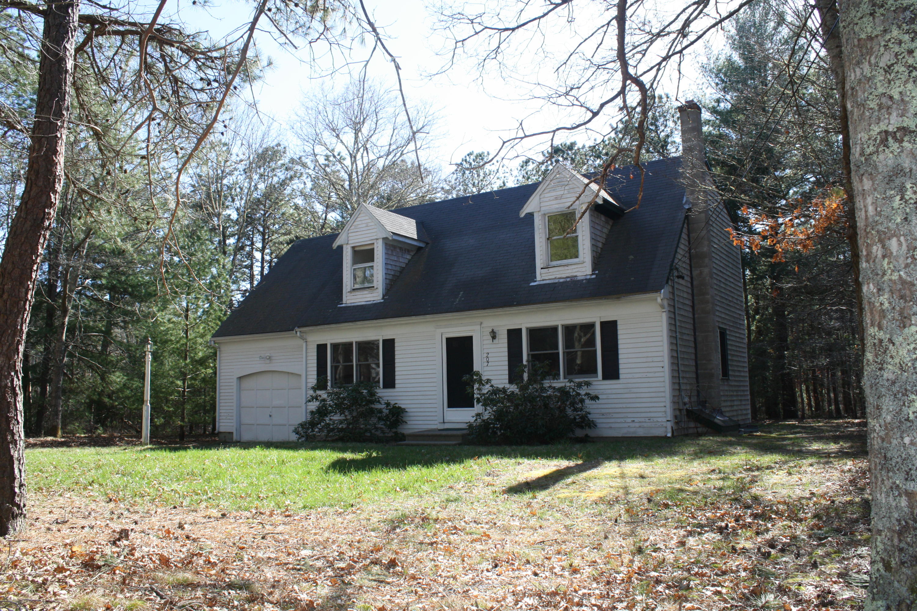 207 Simon Narrows Road Mashpee, MA 02649 - Photo 1 of 18 a view of a house with a yard