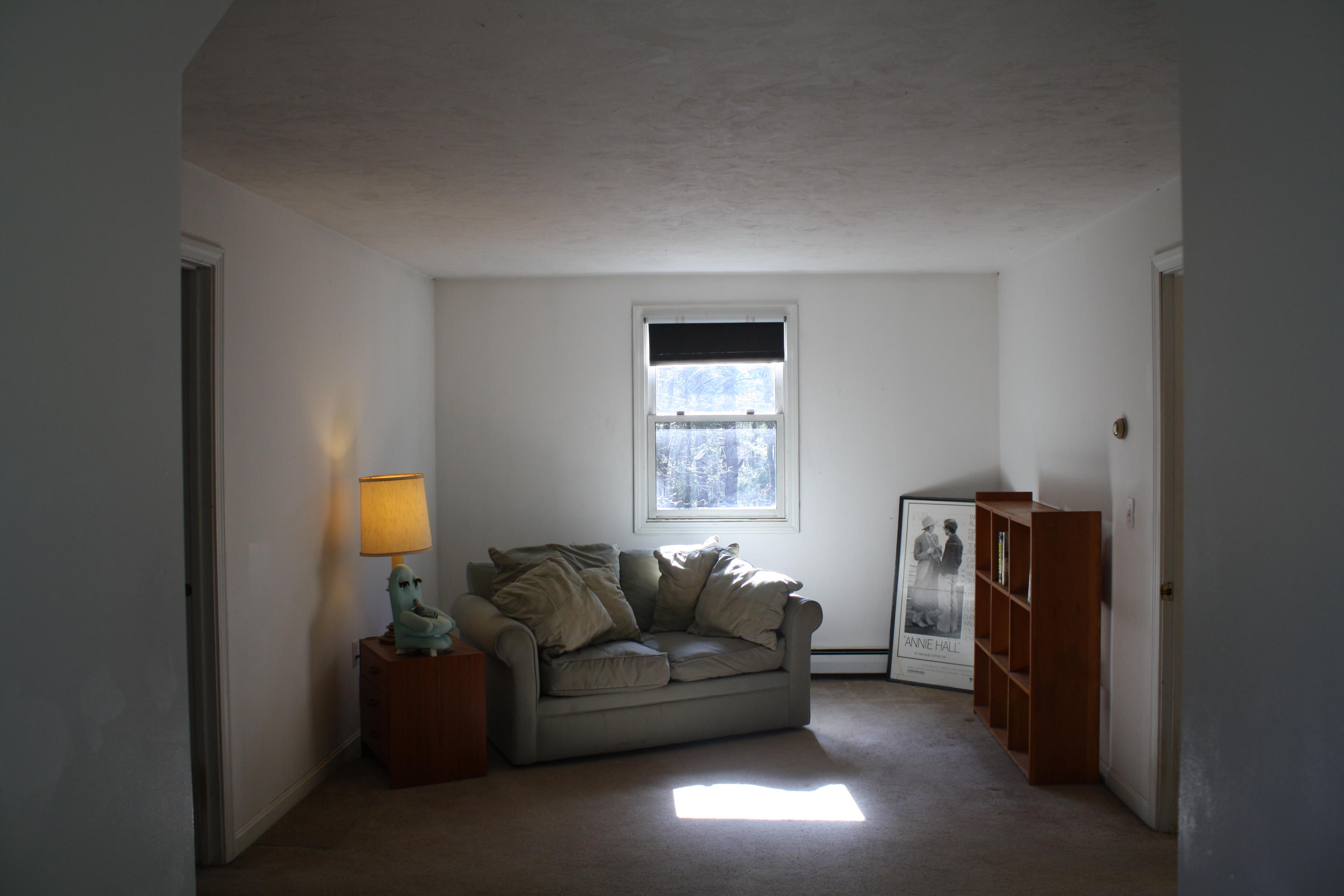 207 Simon Narrows Road Mashpee, MA 02649 - Photo 13 of 18 a living room with furniture and a window