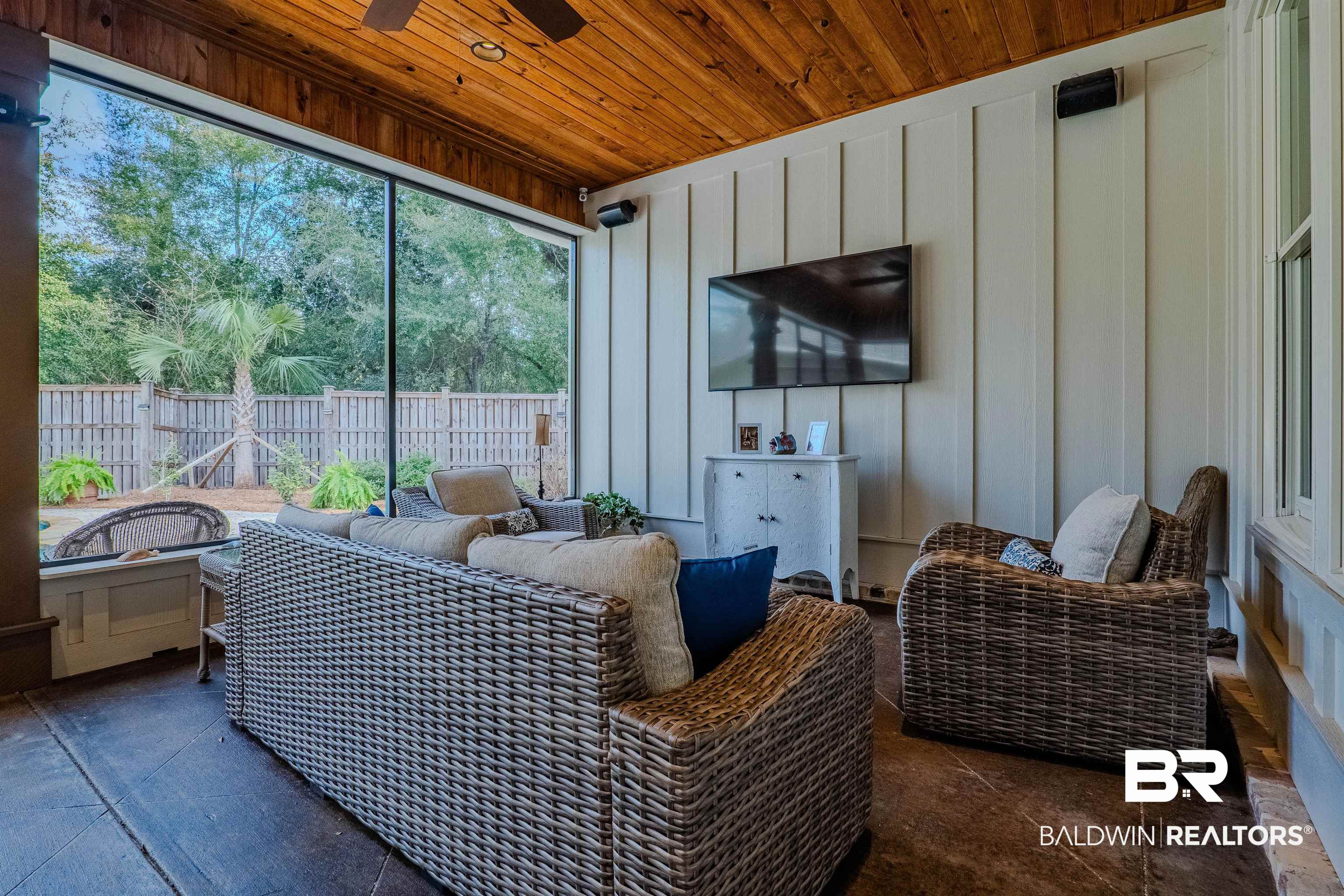 708 Manning Place Fairhope, AL 36532 - Photo 43 of 58 Sunroom with a healthy amount of sunlight, wooden ceiling, and ceiling fan