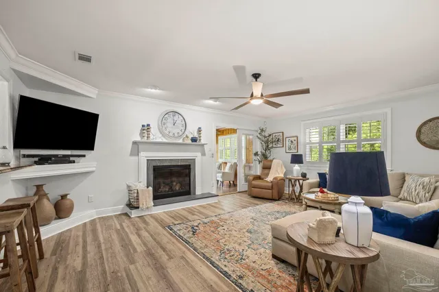 a kitchen with a refrigerator and a sink