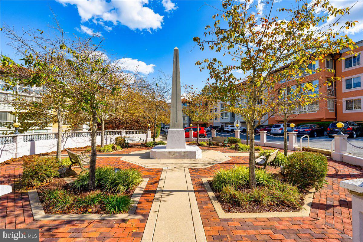 14805 Pennfield Circle, Unit 201 Silver Spring, MD 20906 - Photo 35 of 47 a view of a pathway with a yard