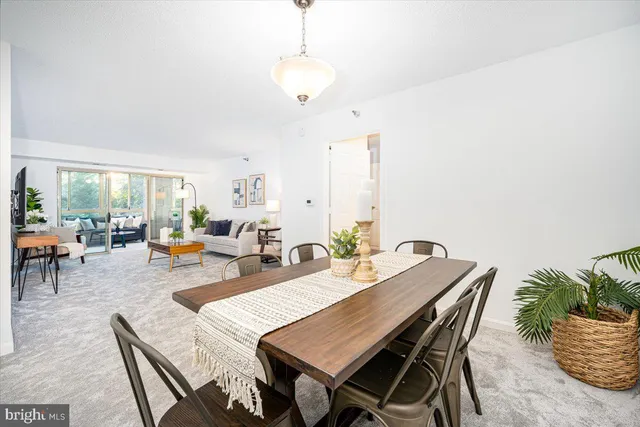 a view of a dining room with furniture