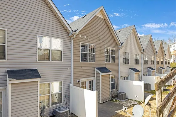 a view of a house with a street