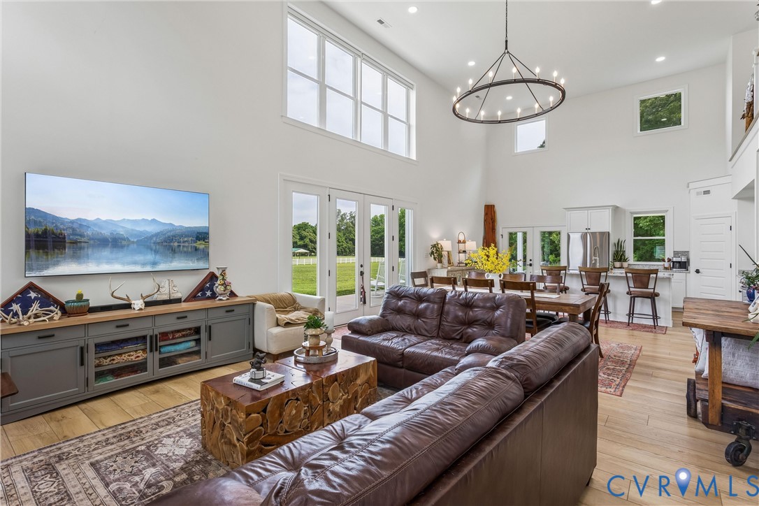 2016 Forge Road Toano, VA 23168 - Photo 50 of 99 Two-story living area with high ceilings, light wo