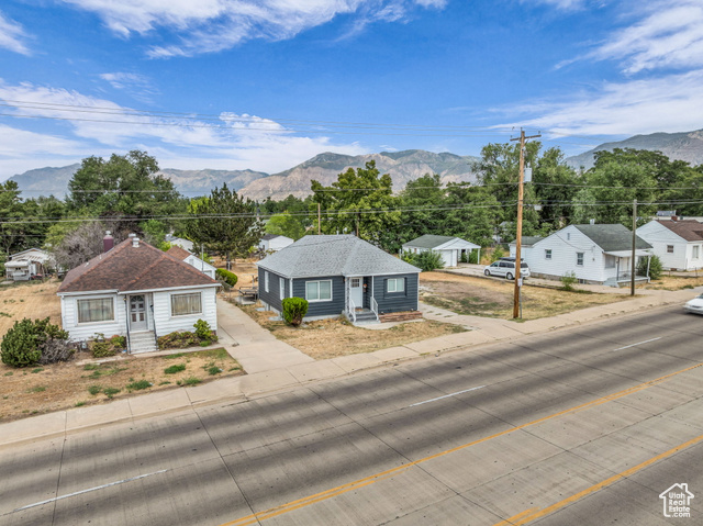 260 36th Street Ogden, UT 84401 - Photo 4 of 15 View of mountain backdrop featuring nearby suburban area