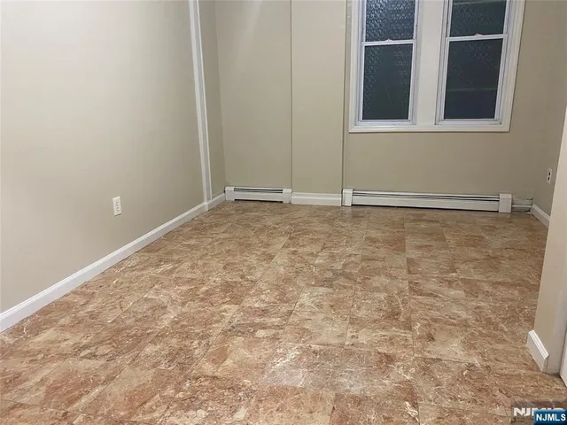 a view of a room with an empty space