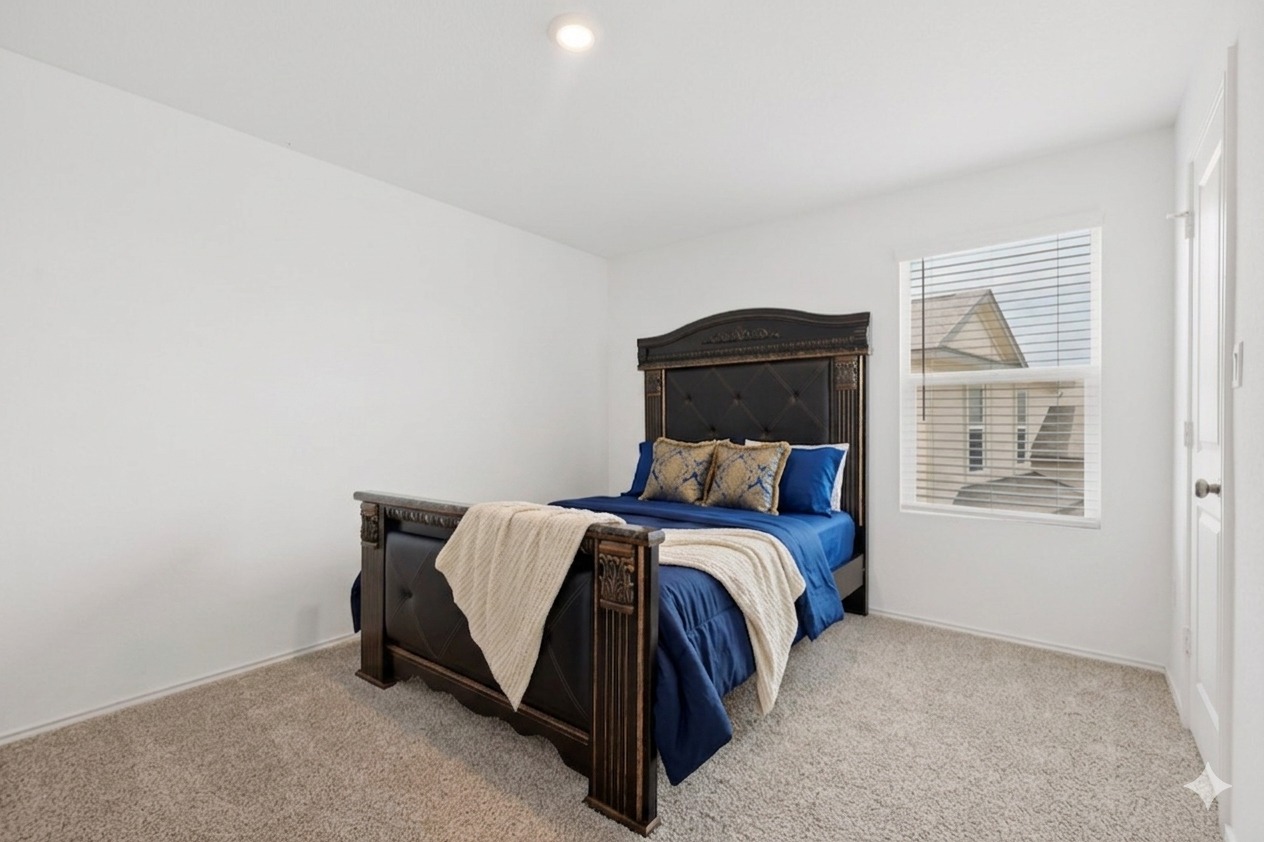 936 Mallow Road Leander, TX 78641 - Photo 11 of 16 Recessed ceiling lighting, a window with blinds, and neutral carpet flooring
