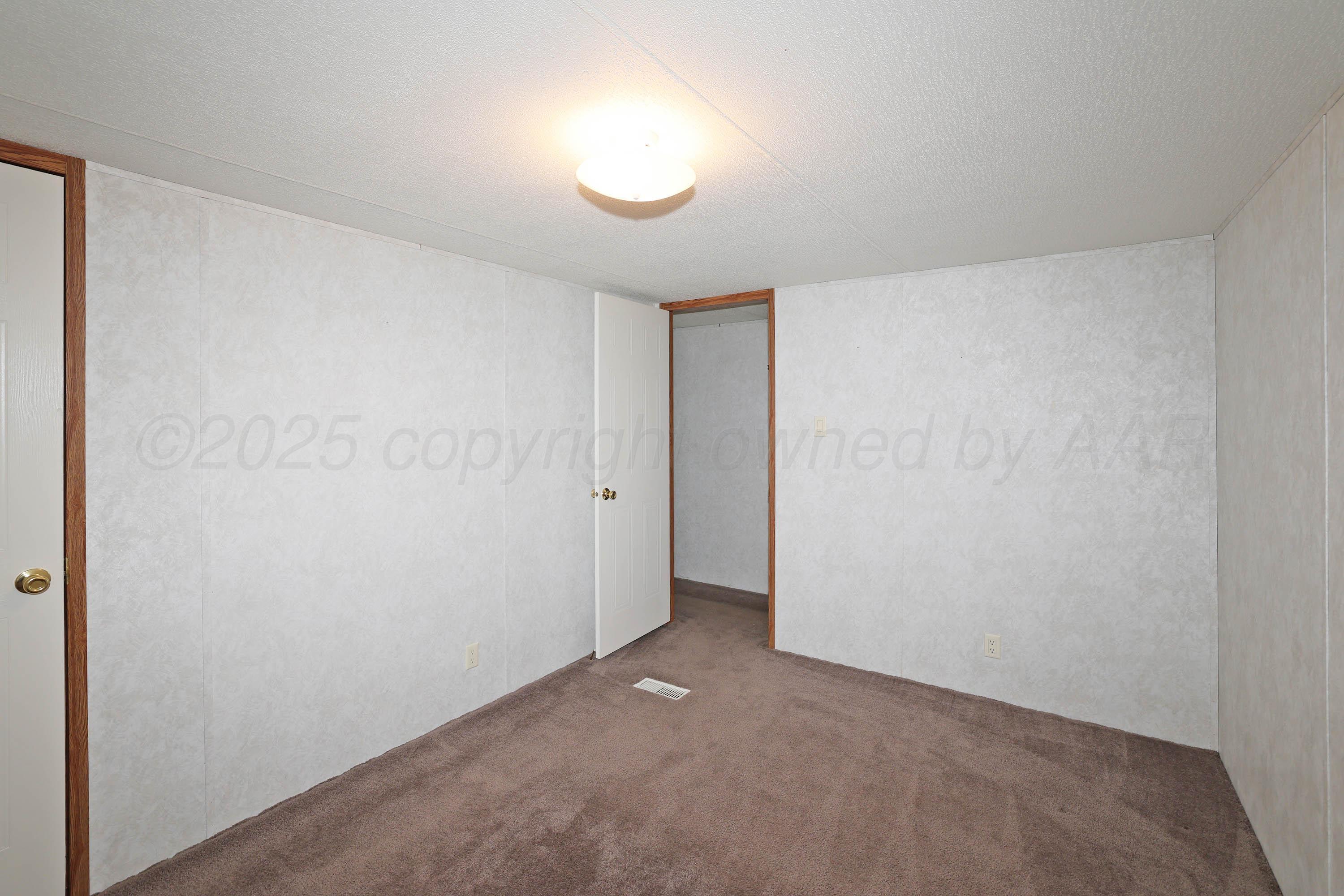 4301 West McCormick Road Amarillo, TX 79118 - Photo 17 of 26 18-3rd Bedroom
