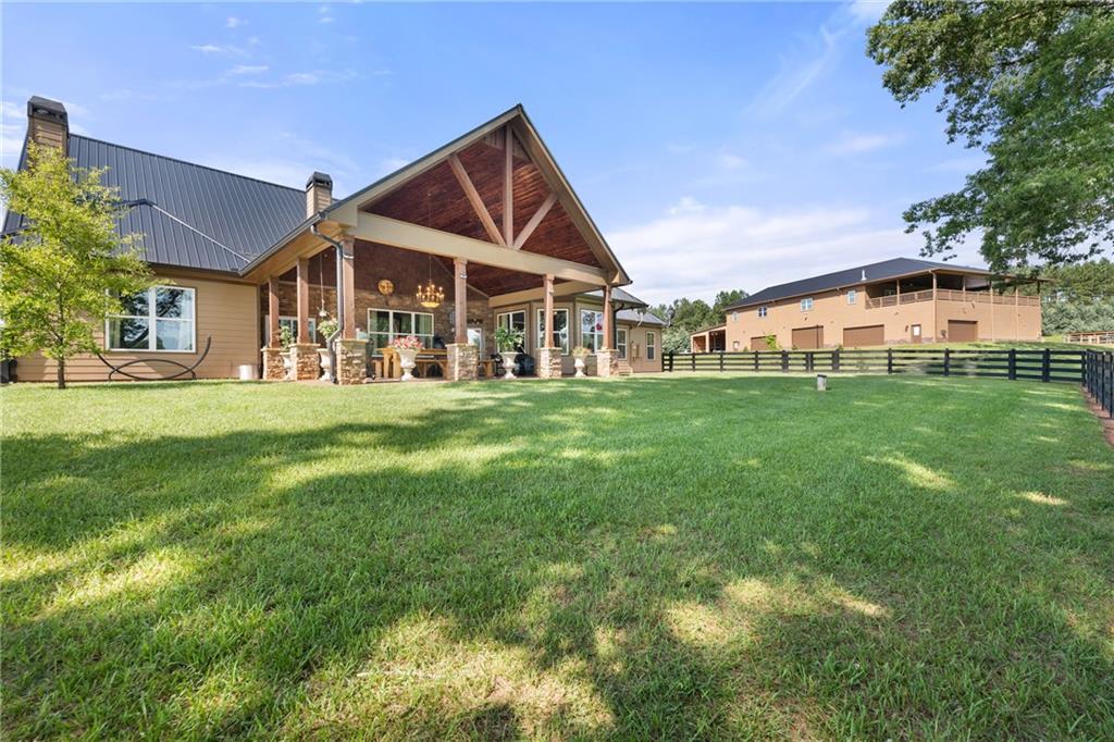 8991 Bill Savage Road Lula, GA 30554 - Photo 1 of 1 a view of a house with a yard