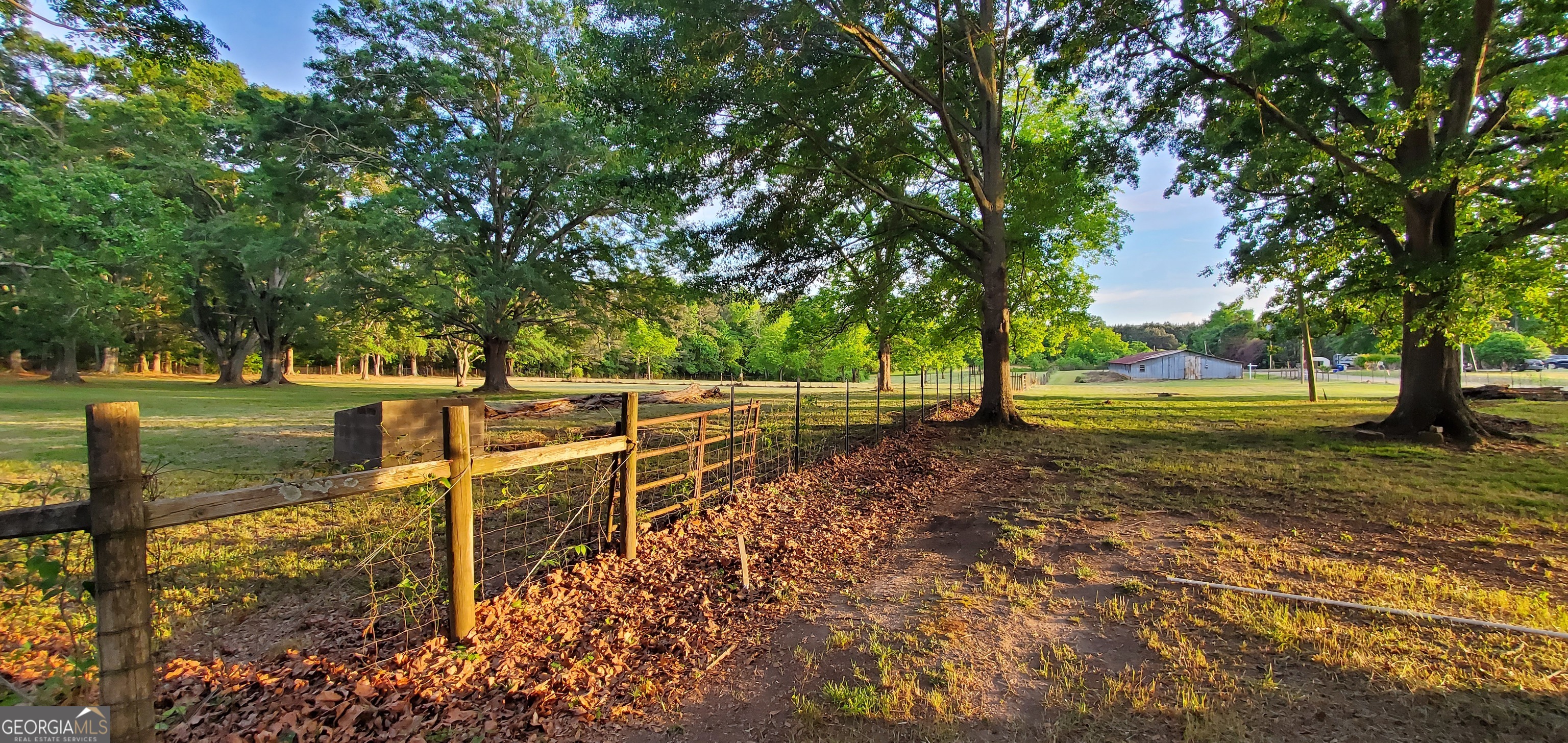 1061 Burger Road Watkinsville, GA 30677 - Photo 30 of 43 a view of a yard with wooden fence