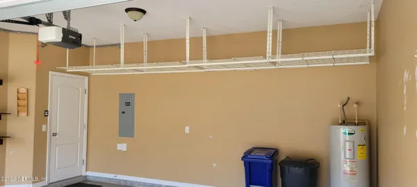 a view of a glass room and wooden floor