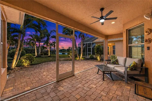 a view of a chairs and tables in the patio